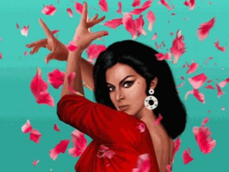 Una mujer con una camisa roja y un vestido negro, rodeada de pétalos de rosa que caen en el aire. El fondo es un color verde claro.