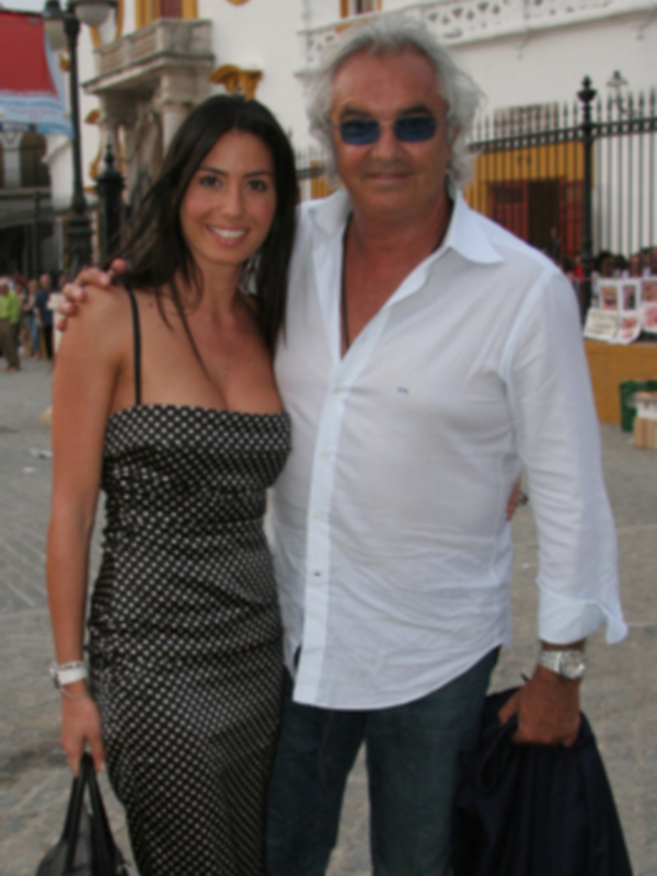 Briatore con su novia en la Feria de Abril