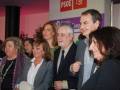 José Luis Rodríguez Zapatero, presidente del PSOE, junto a varios miembros de su partido en un evento.