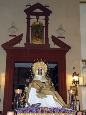 Sevilla. Traslado de los titulares del Baratillo a la Iglesia de San Jorge, para su misa principal.