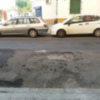 Baches y socavones en las calles de Sevilla