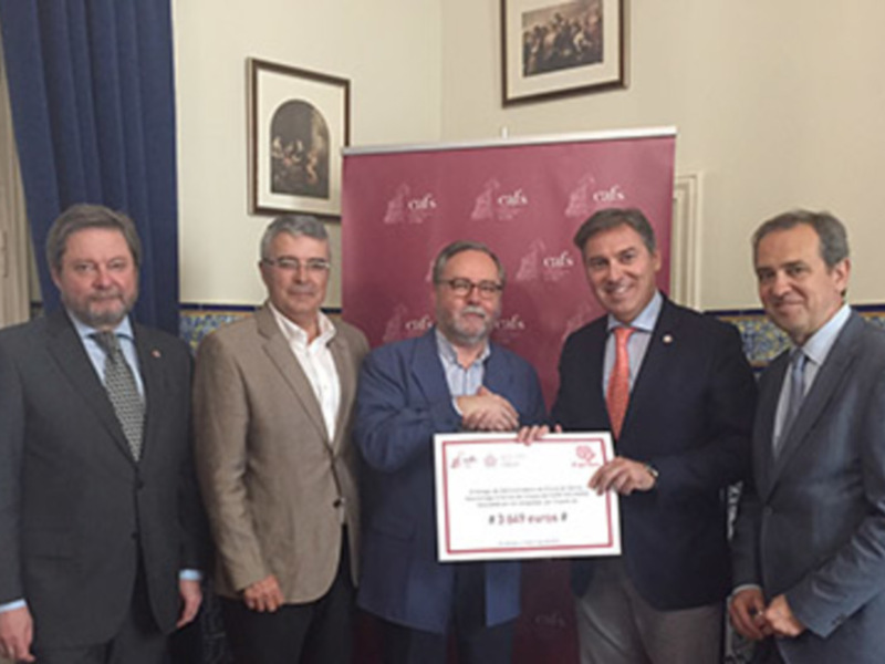 El Colegio de Administradores de Fincas de Sevilla entrega el talón del euro solidario a Cáritas Diocesana