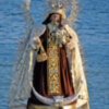 La Virgen del Carmen del puente de Triana procesionó por su río y por su barrio.