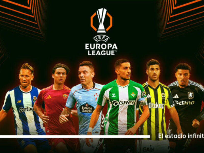 A seis jugadores de fútbol en diferentes equipos, con el escudo de la UEFA Europa League en el centro. El fondo es oscuro con patrones geométricos naranjas y negras, y la imagen está acompañada por el texto "El estadio infinito" en la parte inferior.